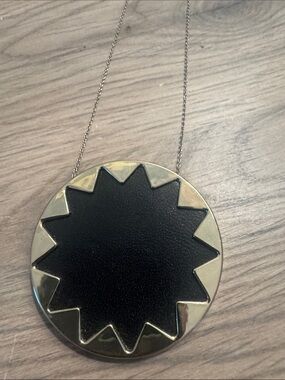 Black and Gold Starburst Round Pendant Necklace